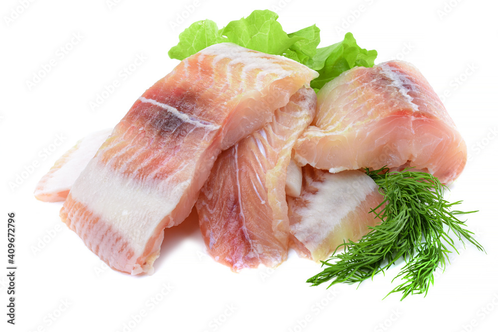 Pangasius fish fillet, pieces on a green lettuce leaf. Isolated on a white background. Fresh Fish Fillet. Pangasius fish fillet, pieces on a green lettuce leaf. Isolated on a white background. Fresh Fish Fillet.