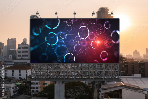 Canvas Print Glowing hologram of technological process on billboard, aerial panoramic cityscape of Bangkok at sunset