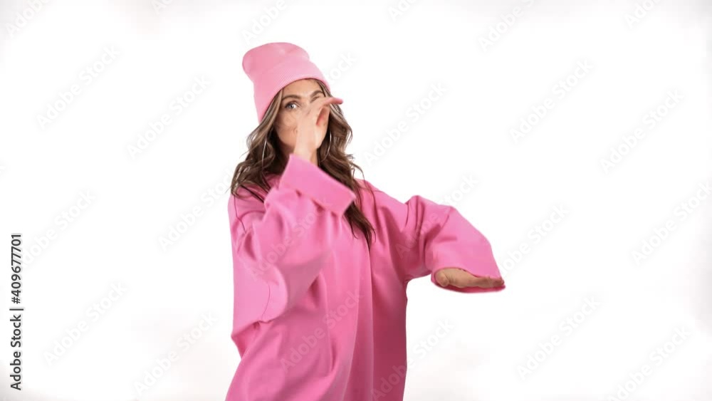 Joyful feminine dancer performing hip hop choreography posing isolated. Shot with RED camera in 4K Joyful feminine dancer performing hip hop choreography posing isolated. Shot with RED camera in 4K