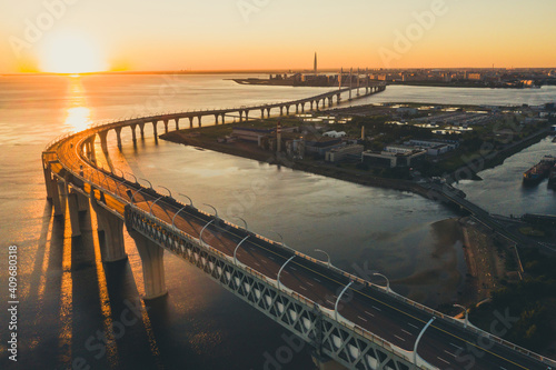 High-speed toll road, highway bypassing the city center St. Petersburg, the central section of the western high-speed section. A beautiful view of the sunset over the Gulf of Finland