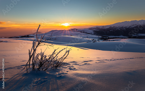 Fototapeta Naklejka Na Ścianę i Meble -  Golden sunset in the Lessinia mountains