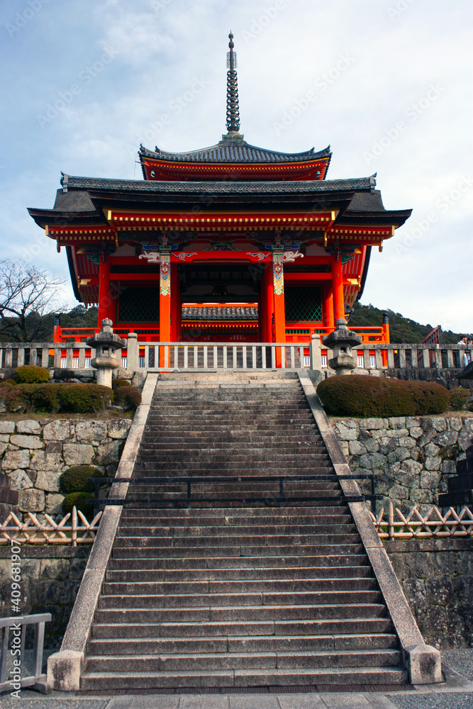 Fototapeta premium Stairs leading to red colored Zuigudo, Nishimon Temple at Kiyomizudera Temple in Kyoto in Japan