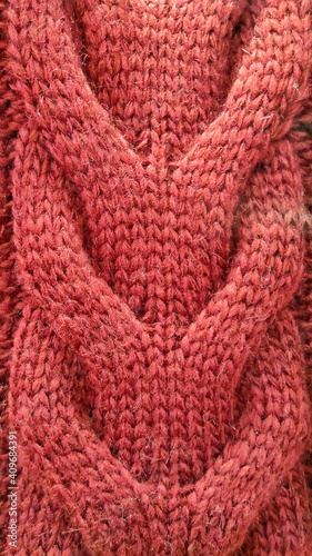 background and texture of woolen knitted fabric. sweater pattern.