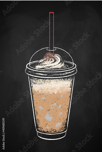Iced coffee cup isolated on black chalkboard