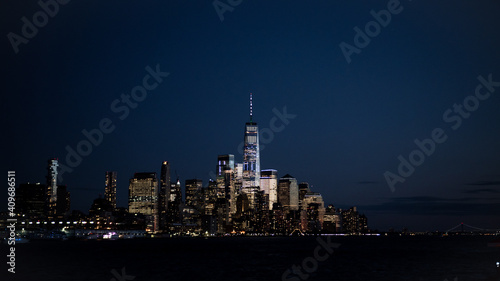 Wall Street Manhattan skyline night from water