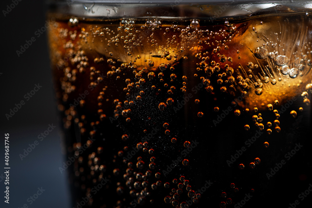 glass of coca cola with ice on a black background, closeup Stock Photo ...