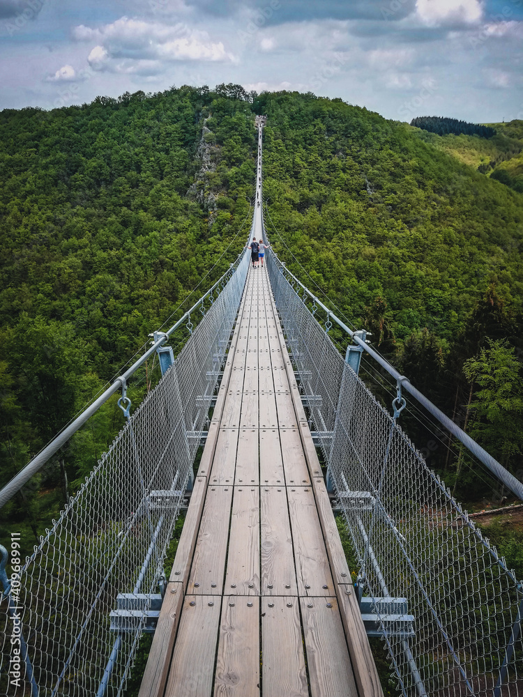 Geierlay Suspension Bridge in Hunsrück Mountain Range. It is the second longest suspension bridge in Germany and a famous tourist attraction.