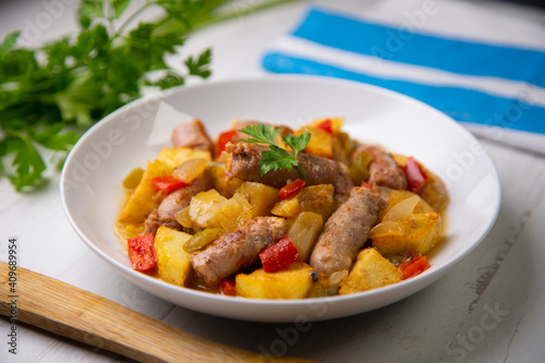 Salchichas stew with potatoes and paprika