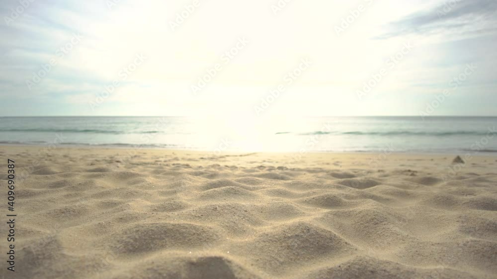 Beach Sand Texture. Scene of Beautiful beach sand texture in summer sun. Blur Beach sea relaxing and sky sunlight in sunset time. Camera on slide dolly. Beach Sand Texture. Scene of Beautiful beach sand texture in summer sun. Blur Beach sea relaxing and sky sunlight in sunset time. Camera on slide dolly.