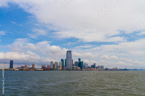 The view of the New York cityscape taken from the ferry on a cloudy day © Mirko