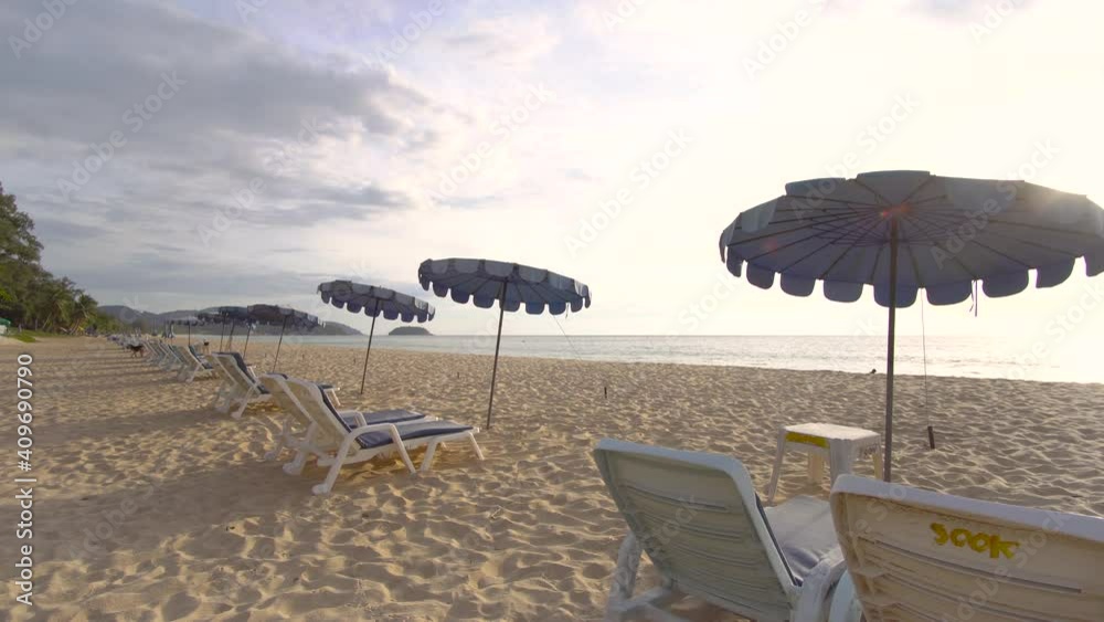 Beach Sand And Summer sun. Scene of Relaxing seat on beach sand texture in summer sun. Sky sunlight and sunset time. Camera on slide dolly. Beach Sand And Summer sun. Scene of Relaxing seat on beach sand texture in summer sun. Sky sunlight and sunset time. Camera on slide dolly.