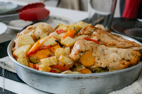 baked chicken with vegetables and seasoning