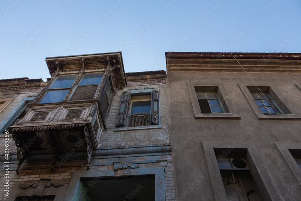 Wooden and stone houses with bay windows in historical basmane streets Wooden and stone houses with bay windows in historical basmane streets