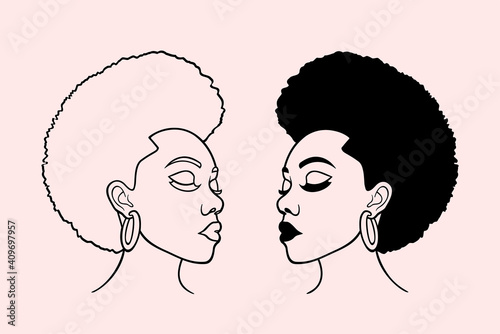 Face of black woman with short hair and earrings