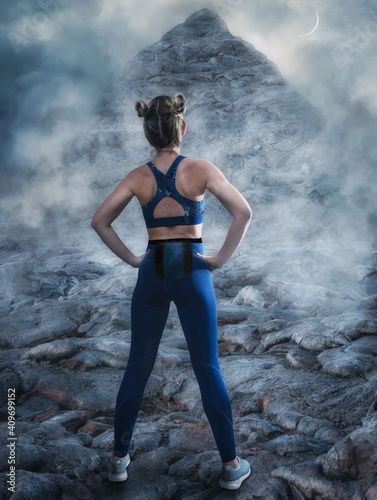 Athletic woman climbing on overhanging cliff rock .Strong climber. Extreme hobby. 