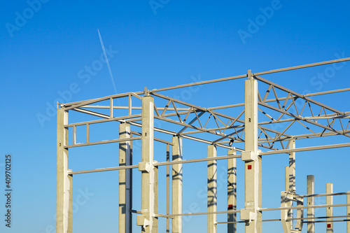 the frame of a new modern factory reinforced concrete structure building