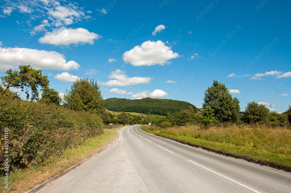Summertime road in the countryside Summertime road in the countryside
