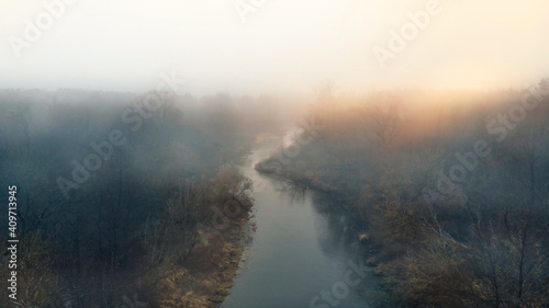 Foggy and sunny morning and view on the river