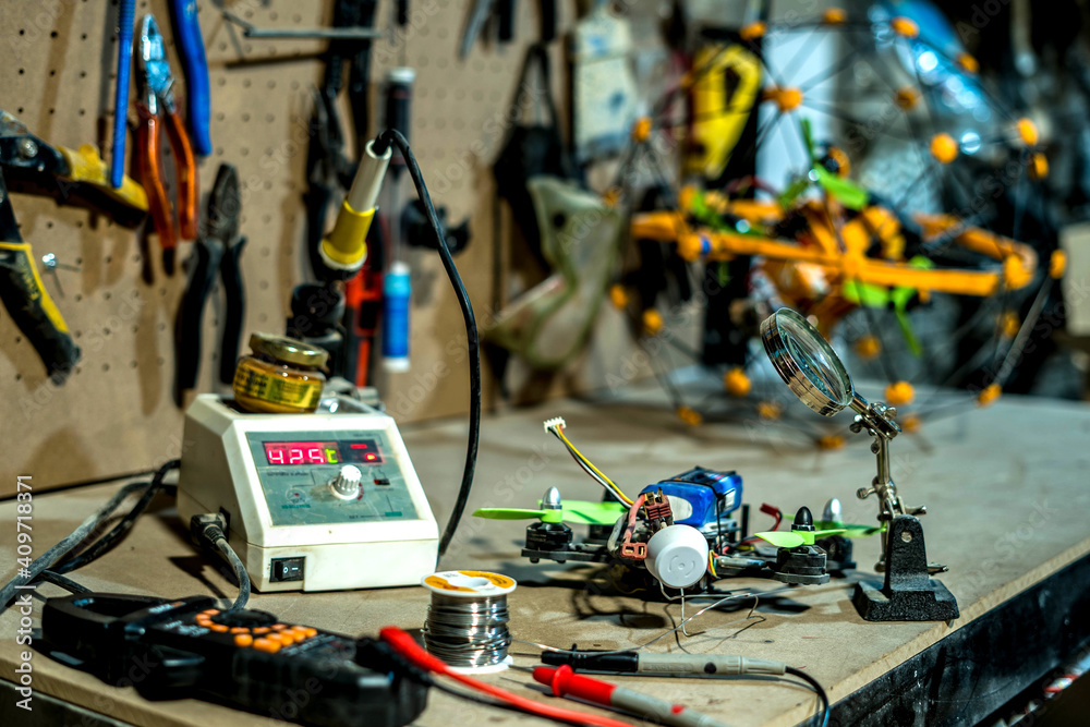 working in an industrial electronics workshop for drones working in an industrial electronics workshop for drones