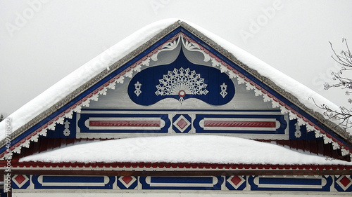 Fronton with carved decor of a russian wooden house