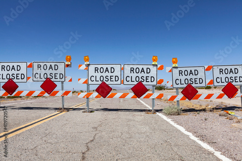 Highway road closed signs a...