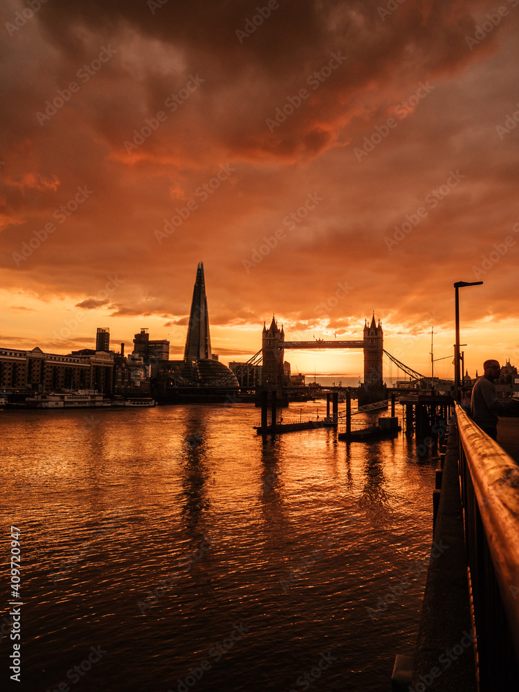 Sunset behind the Tower Bridge in London, United Kingdom Sunset behind the Tower Bridge in London, United Kingdom
