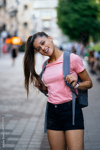 Summer lifestyle fashion portrait of young stylish woman © teksomolika