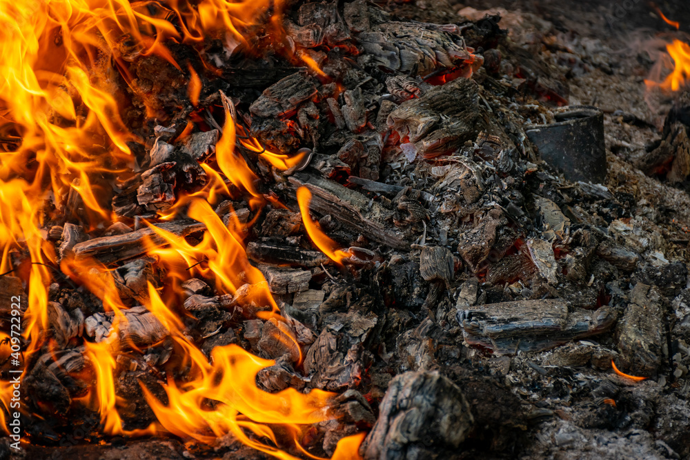 Burning coals at night, rotting coal, barbecue season. Close-up Burning coals at night, rotting coal, barbecue season. Close-up