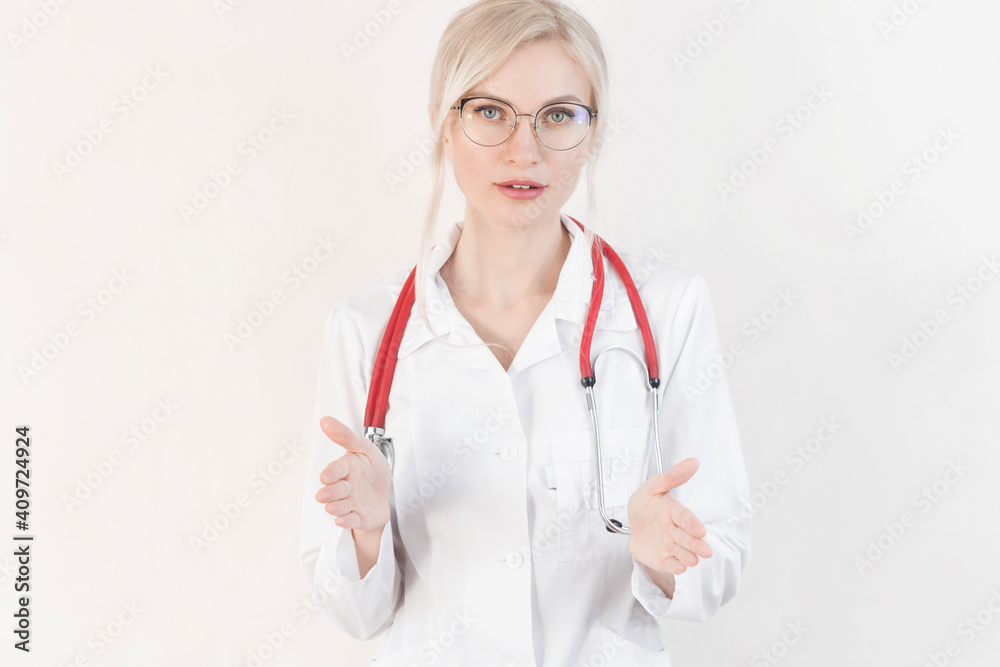 Head shot of woman wearing white coat stethoscope on shoulders looking at camera, doctor make video call interact through internet talk with patient provide help online counseling and therapy concept Head shot of woman wearing white coat stethoscope on shoulders looking at camera, doctor make video call interact through internet talk with patient provide help online counseling and therapy concept