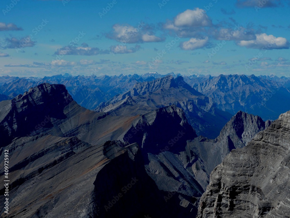 Three Sister with Mount Rundle in a background view at the summit of Mount Lougheed Alberta Canada OLYMPUS DIGITAL CAMERA Three Sister with Mount Rundle in a background view at the summit of Mount Lougheed Alberta Canada OLYMPUS DIGITAL CAMERA
