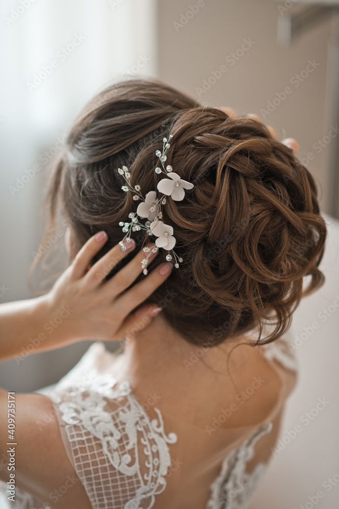 Wedding hair decoration made of beads in the brides hairstyle 2503.