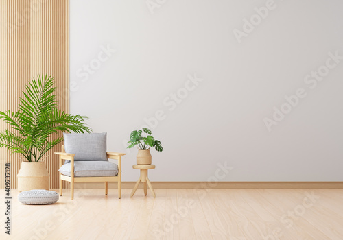 Gray armchair in white living room with free space for mockup, 3D rendering photo