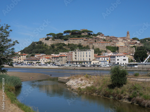 Panorama of Castiglione della Pescaia from the mouth of the Bruna river. In the background the upper part of the village with the walls and the castle.