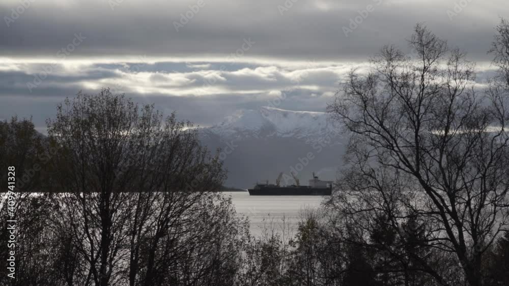 Fishing Trawler On Fjord Under Cloudy Sky Fishing Trawler On Fjord Under Cloudy Sky