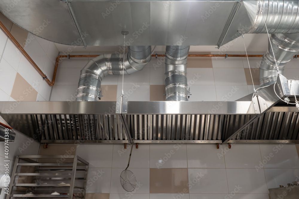 Ventilation in the industrial kitchen. Stainless steel ventilation pipe