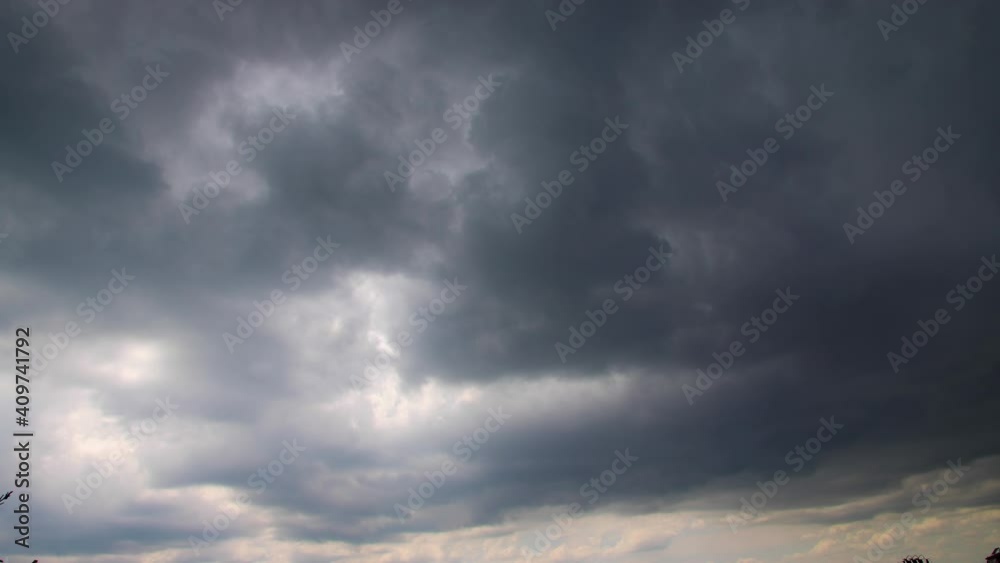 Dramatic moving dark clouds before storm. Dramatic moving dark clouds before storm.