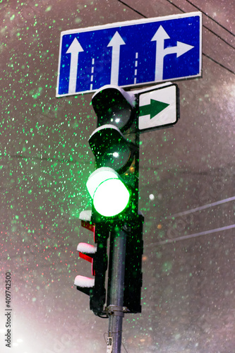 Green traffic light on the road
