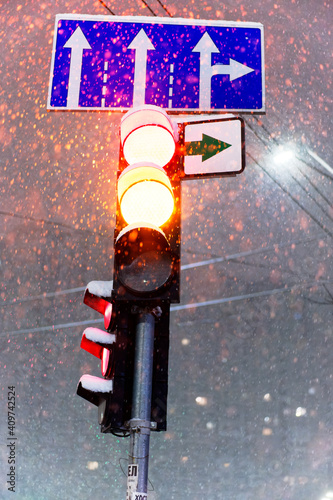 Red, yellow traffic light on the road