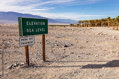 A sign marks sea level near the historic inn at Death Valley National Park, Furnace Creek, California

