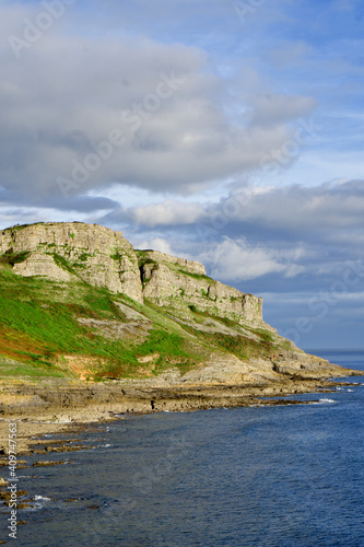Cliffs along the Gower Peninsula  Wales. Beach cliffs and sea. 