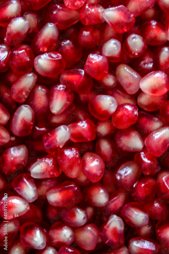 Close up of pomegranate seeds. Vertical view. Pomegranate. Seeds. Close up of pomegranate seeds. Vertical view. Pomegranate. Seeds.