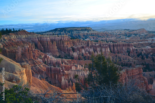 Bryce Canyon National Park during sunrise snow covered with overcast clouds