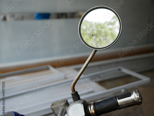 closeup of motorcycle rear view mirror. 