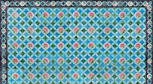 Photography Rows of antique Nyonya Tiles with pink flowers