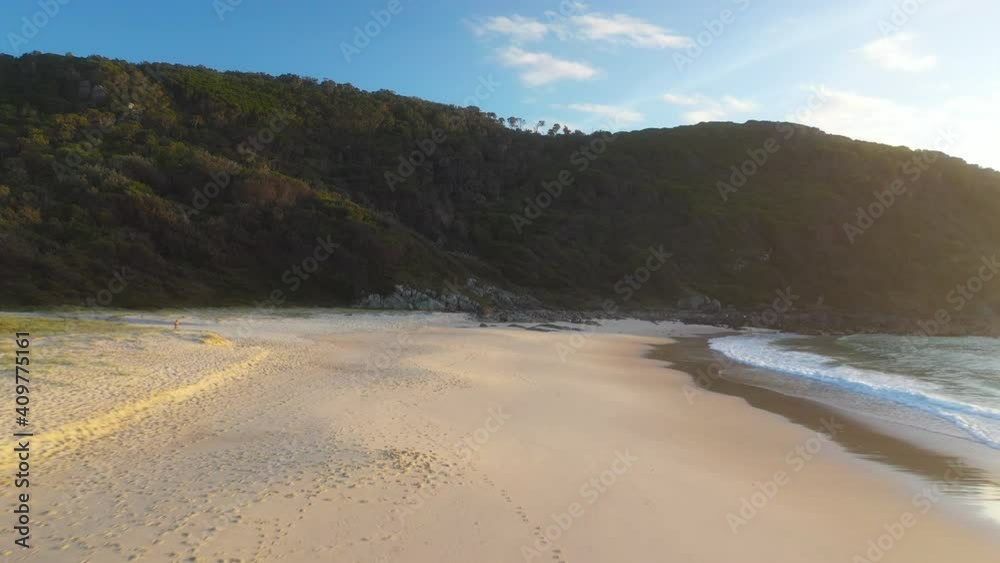 Amazing aerial shot of empty beautiful Australian beach at sunset Amazing aerial shot of empty beautiful Australian beach at sunset