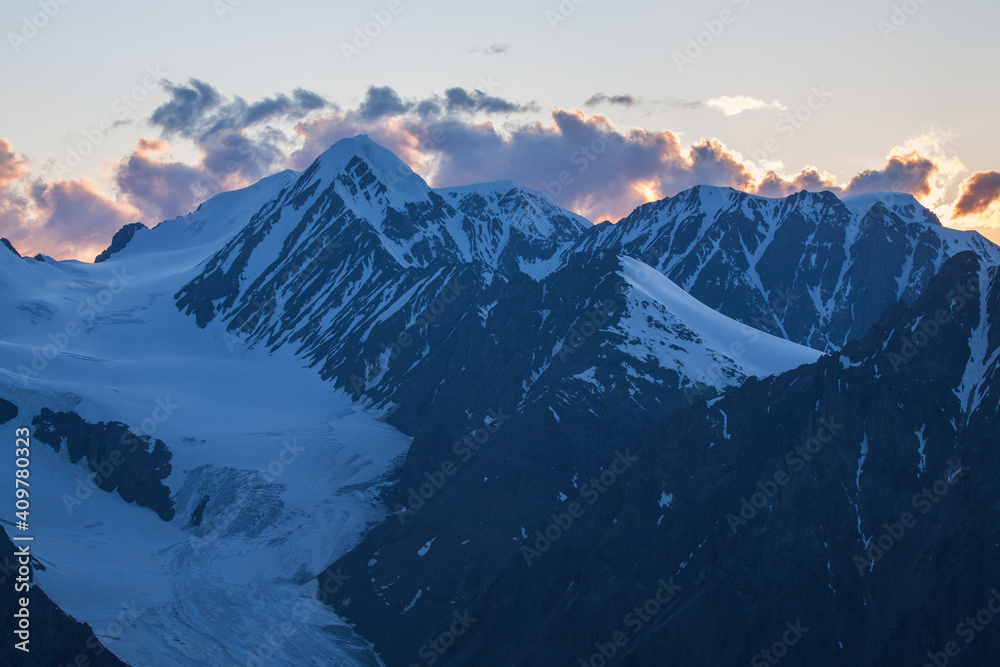 Morning in the mountains, snow-capped peaks