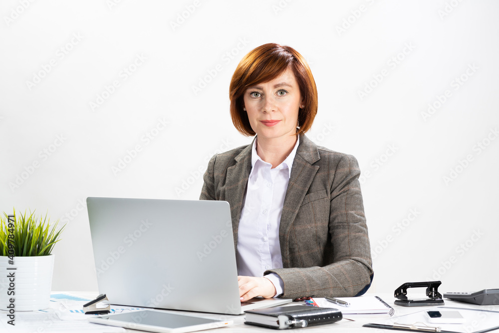 Attractive middle aged businesswoman working Attractive middle aged businesswoman working
