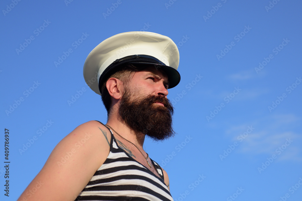 Funny captain sailor wearing hat. Seaman fun. Portrait of serious captain. Bearded sailor, seaman.