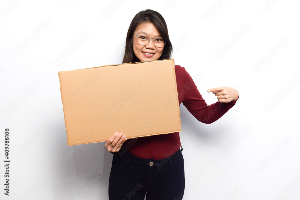 Showing blank sign poster for inscription and text of Young beautiful asian women dress red shirt isolated on white background Showing blank sign poster for inscription and text of Young beautiful asian women dress red shirt isolated on white background