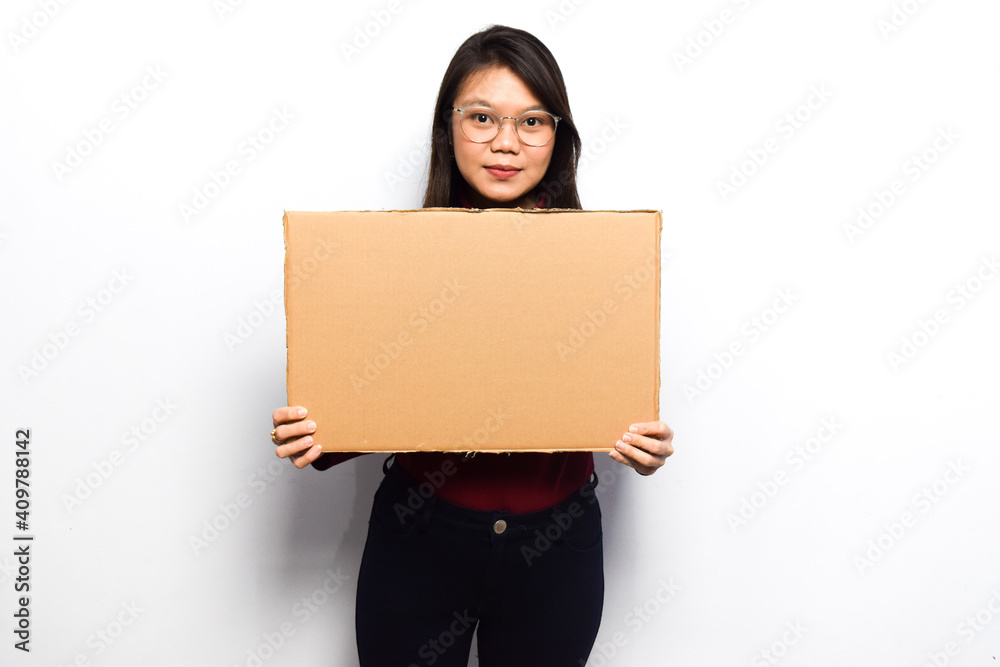 Showing blank sign poster for inscription and text of Young beautiful asian women dress red shirt isolated on white background Showing blank sign poster for inscription and text of Young beautiful asian women dress red shirt isolated on white background